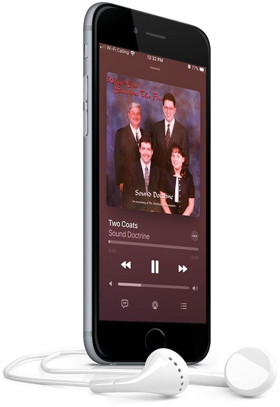 A cell phone with a picture of a family on the screen.