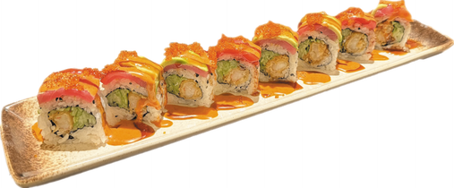 Assorted sushi and sashimi on a platter with lemon, wasabi, and garnish