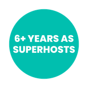 Turquoise circle with white text: “6+ YEARS AS SUPERHOSTS”