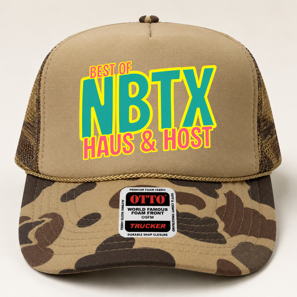 Camouflage trucker hat with tan crown and colorful “NBTX Haus & Host” logo
