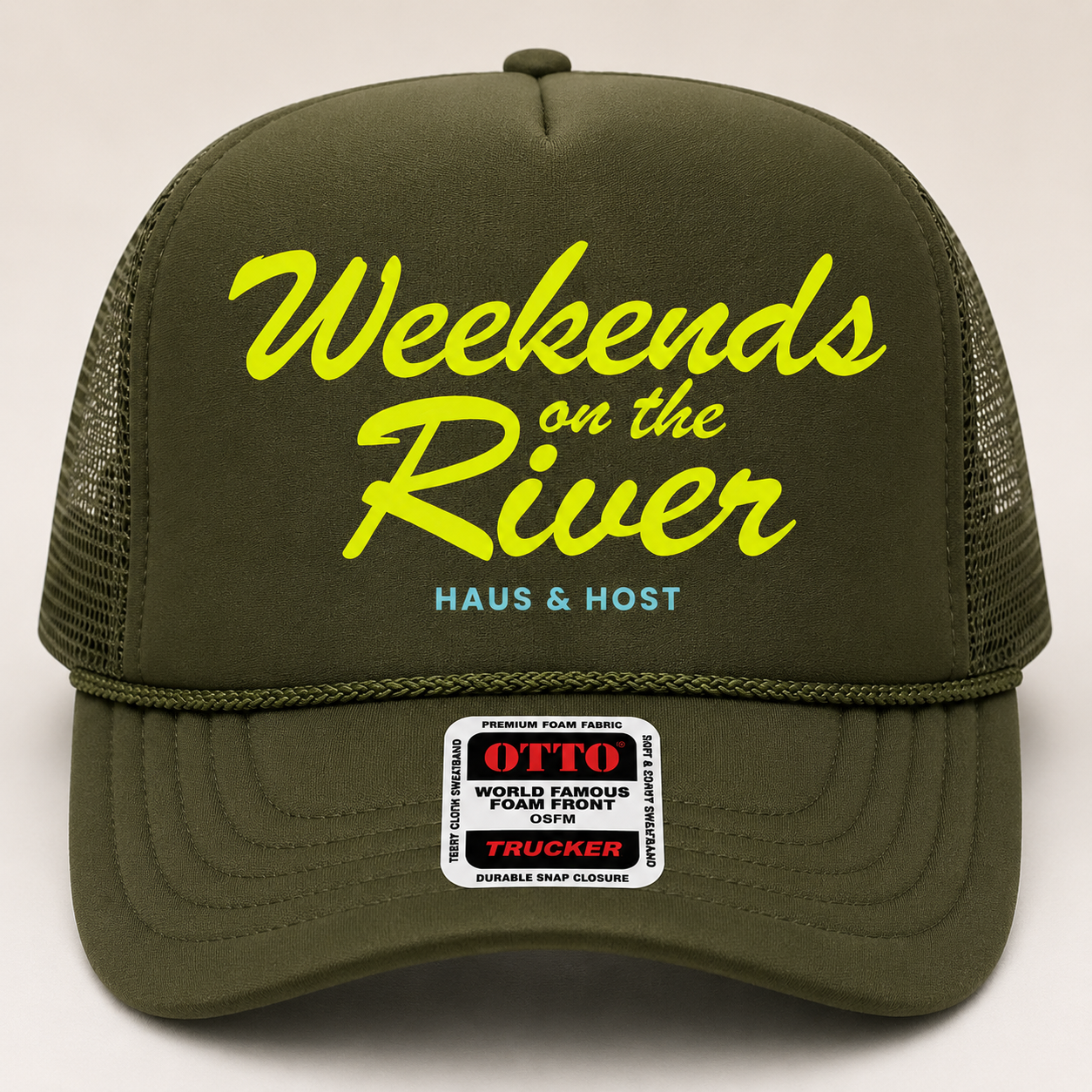 Olive green baseball cap with yellow “Weekends on the River” text and a black OTTO patch.