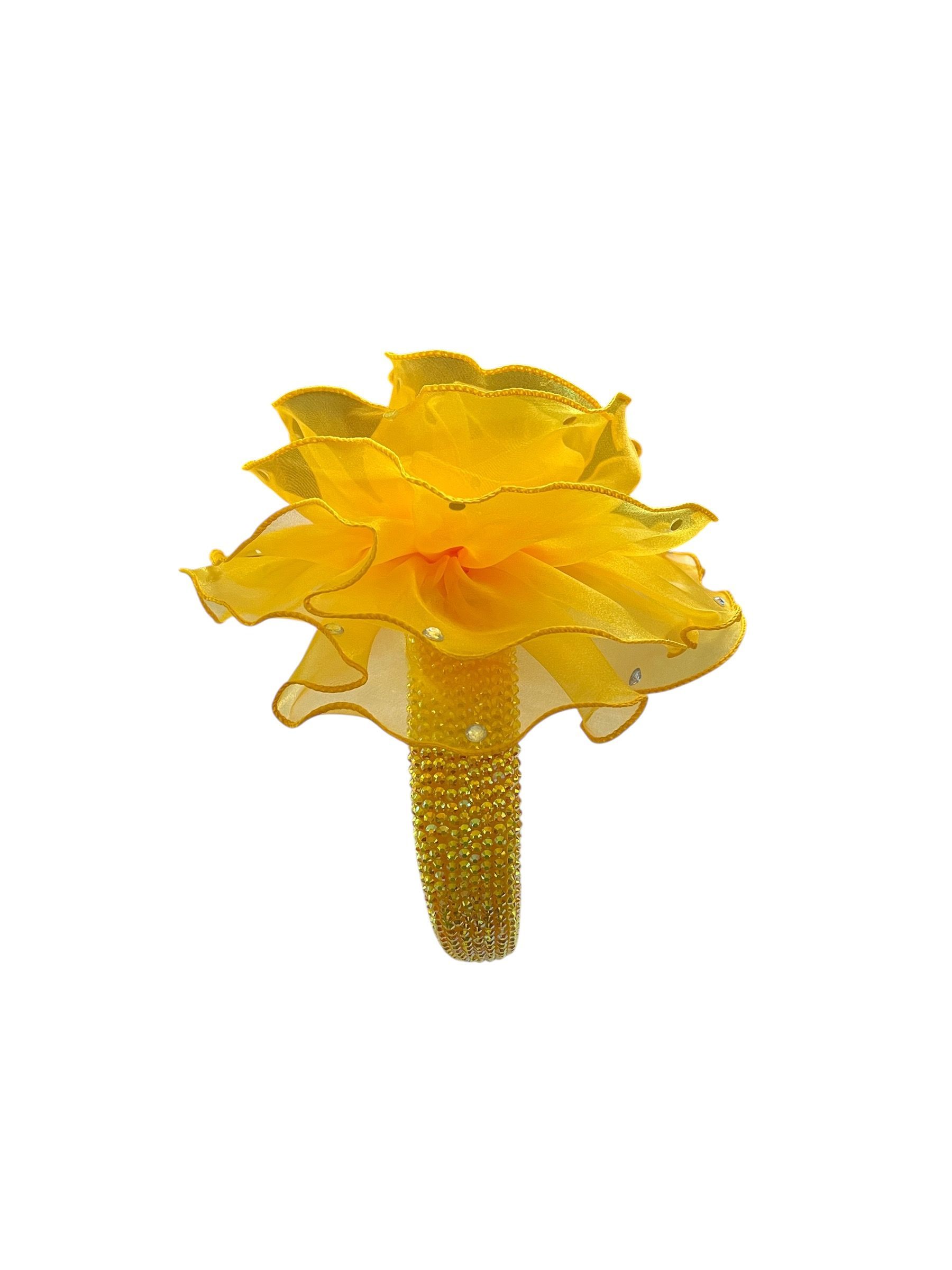 Yellow rose blossom centered on a white background