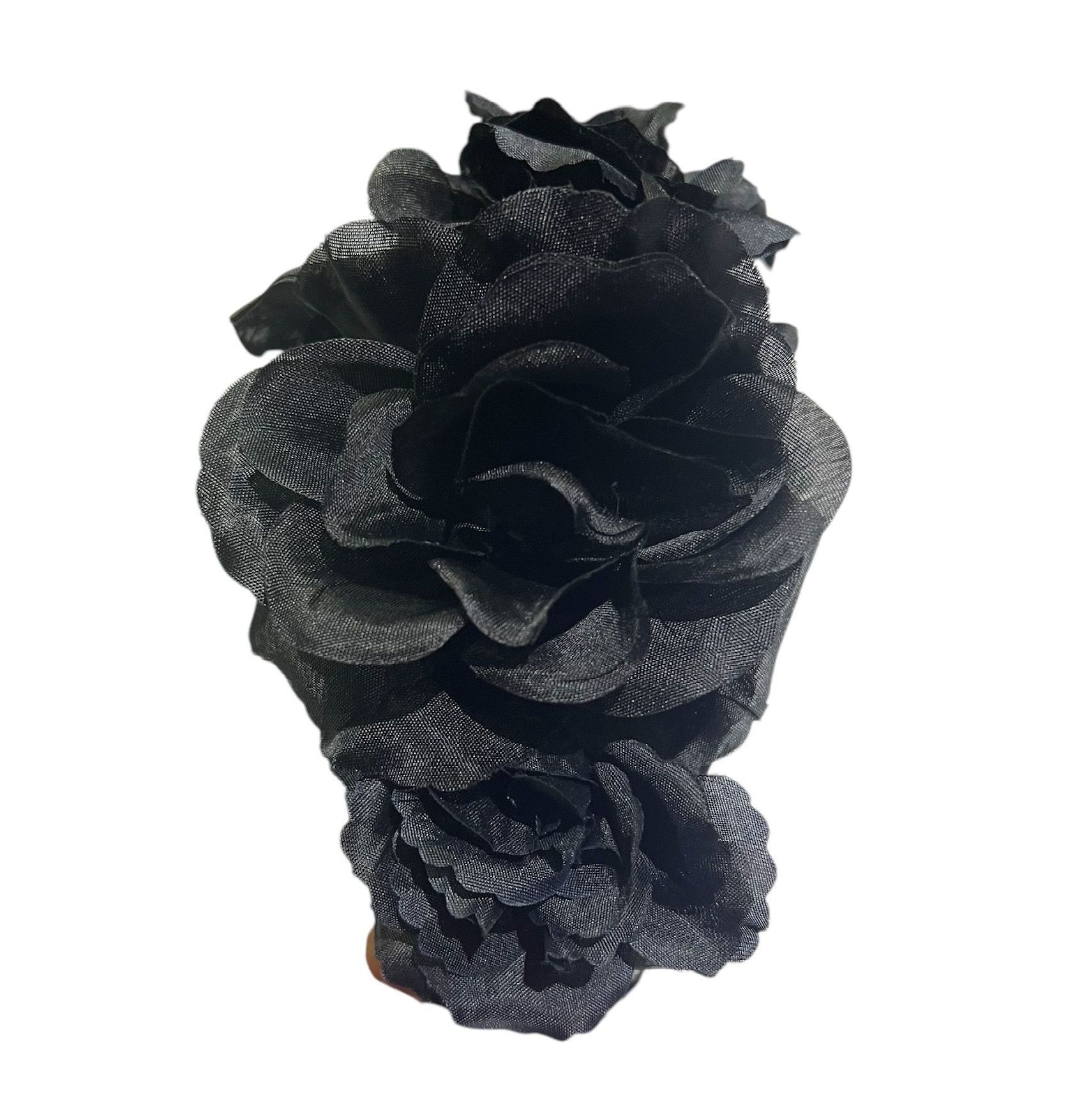 Black textured decorative floral arrangement on a white background