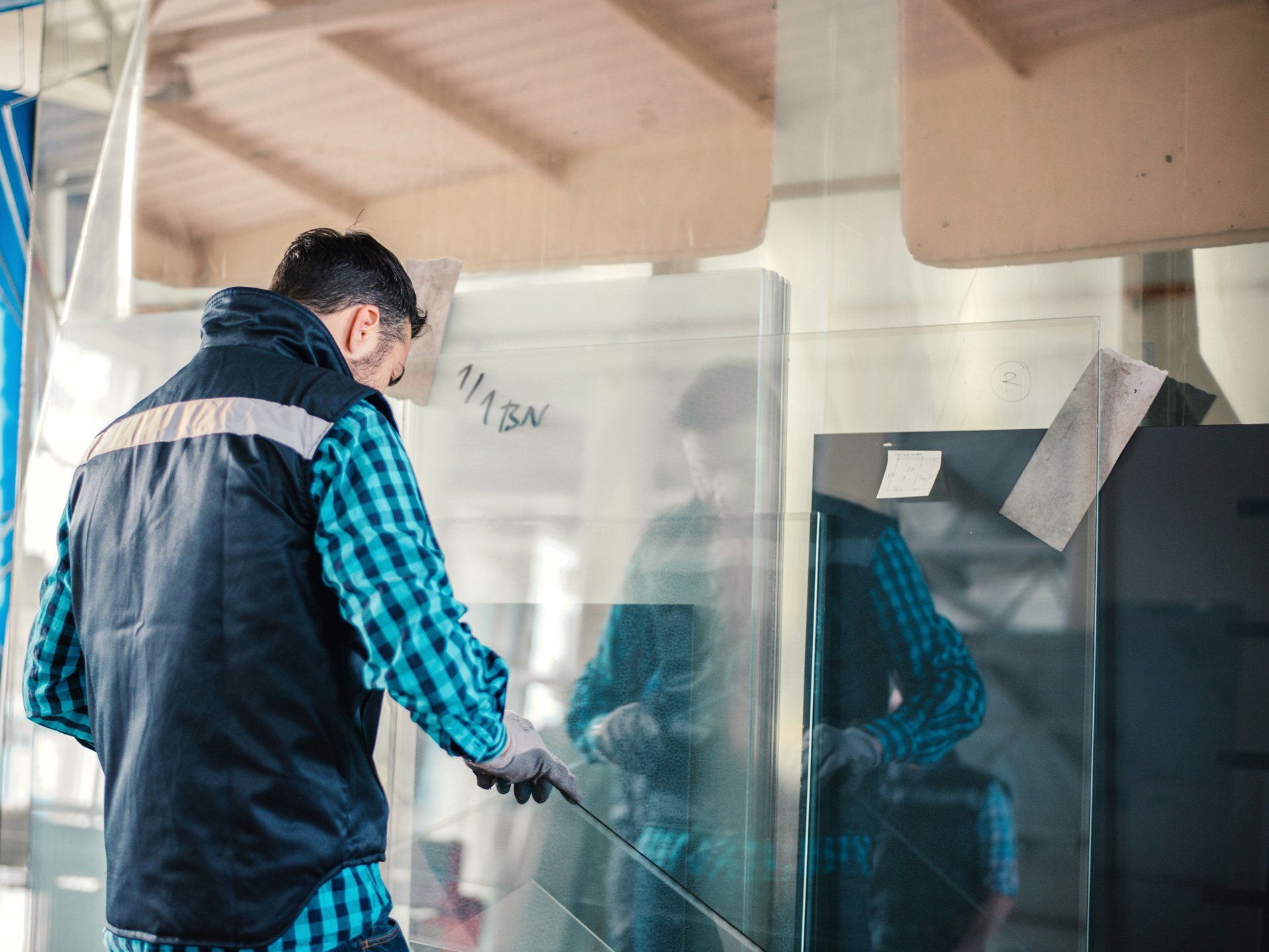 A man preparing a glass | Fyshwick, ACT | EW Glass A man preparing a glass | Fyshwick, ACT | EW Glass