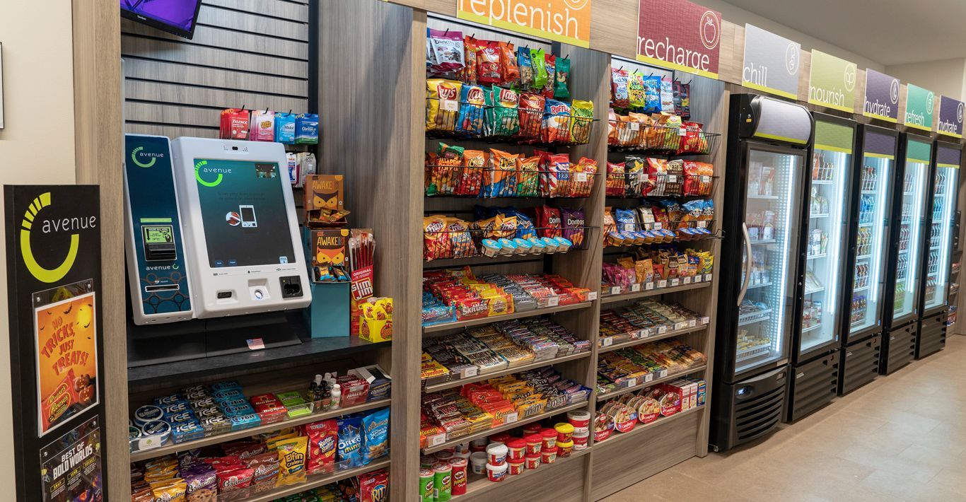 There is a vending machine in the middle of the store.