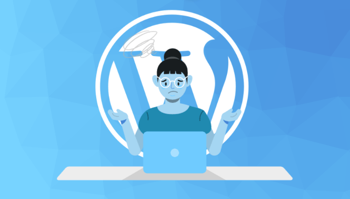 A woman is sitting at a desk using a laptop computer looking confused.