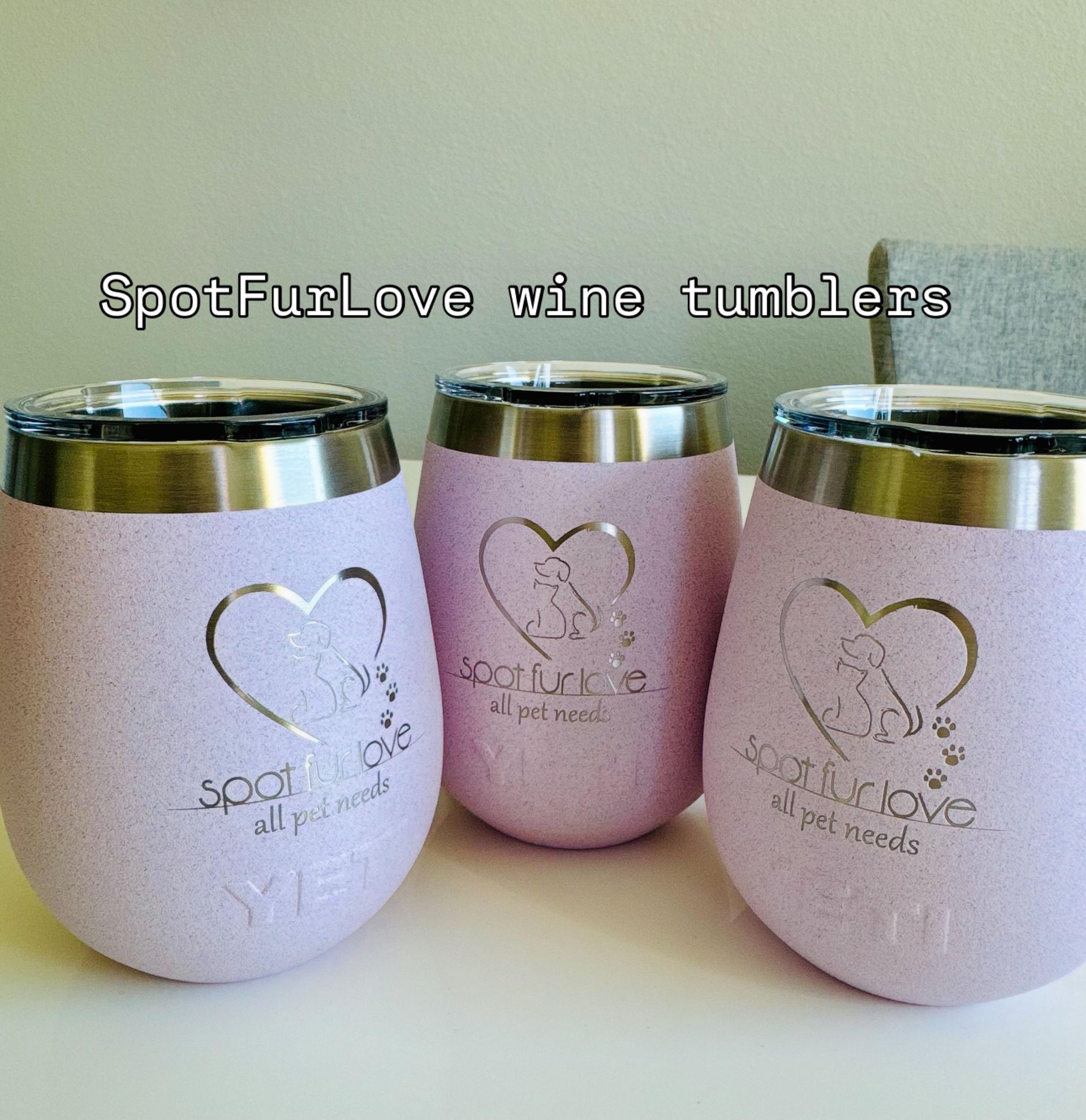 Three pink glitter wine tumblers with heart-shaped pet logos. Silver lids and the words SpotFurLove visible.
