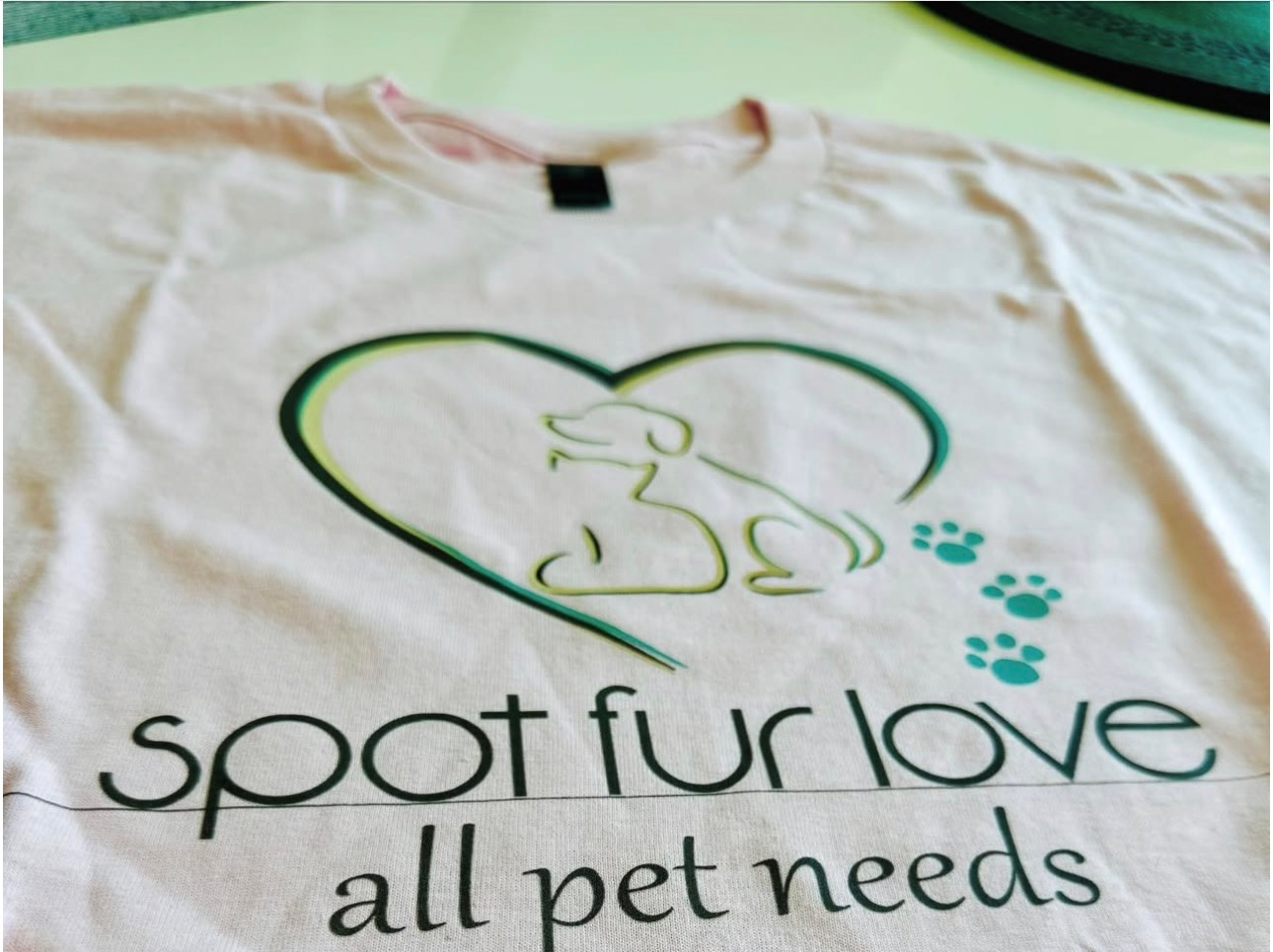 Pink t-shirt with a heart and dog graphic, 