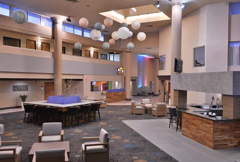 A large room with a lot of chairs and tables