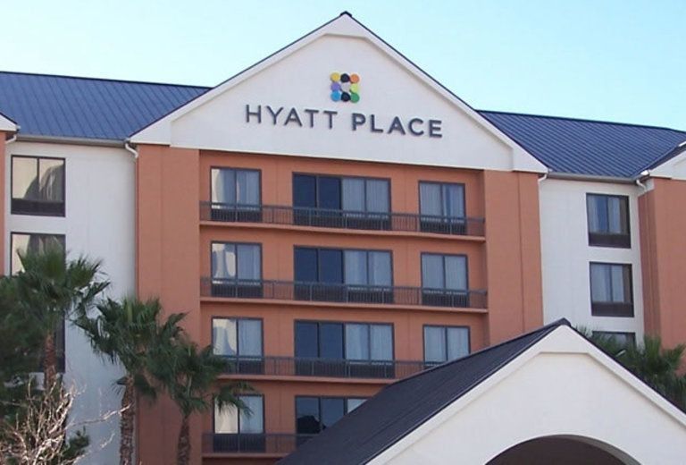 A large building with the word hyatt place on it