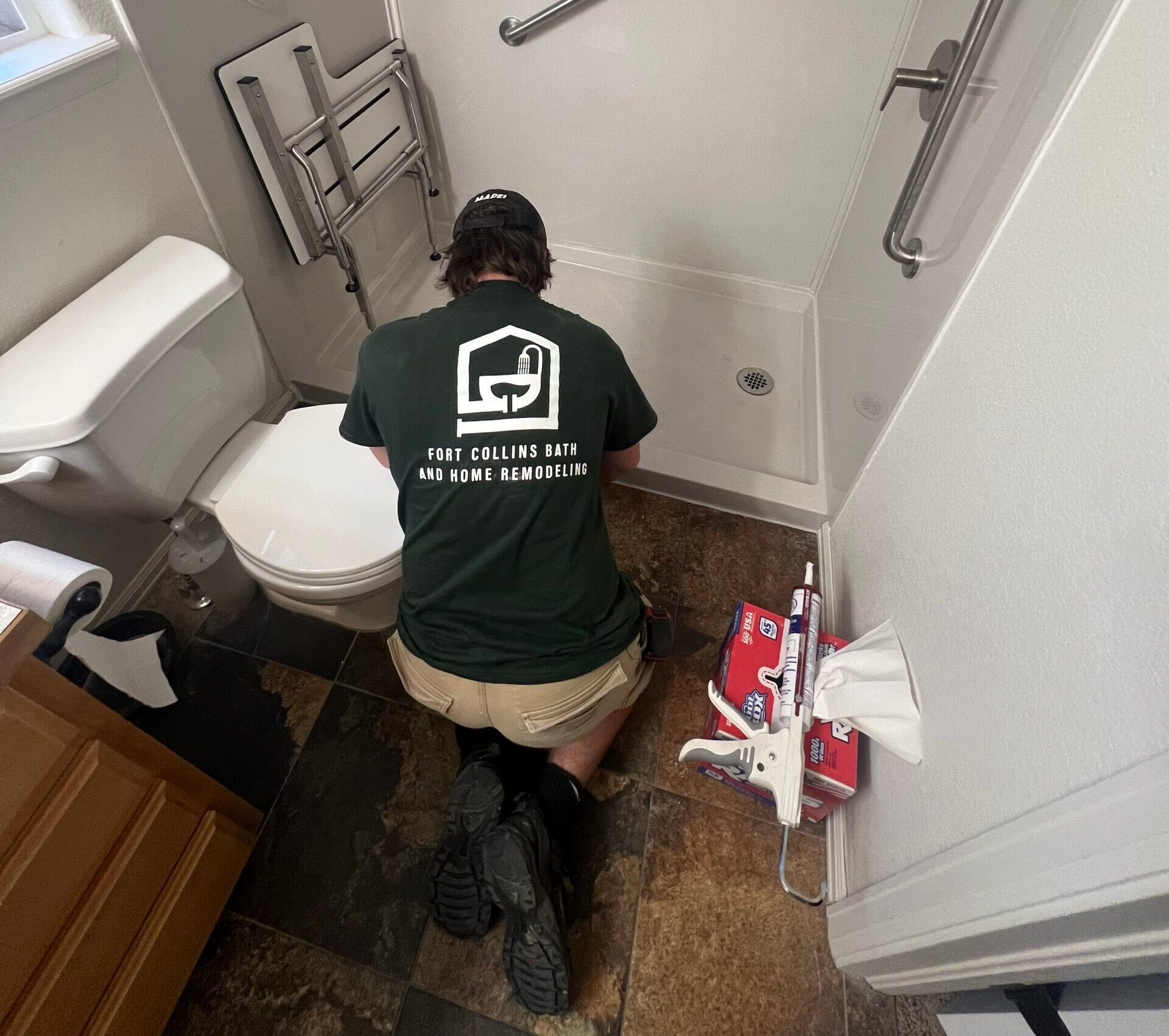 Professional shower remodel contractors installing a modern tile shower.