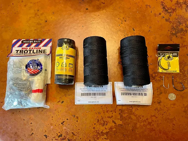 a bunch of fishing gear including a bag that says trotline