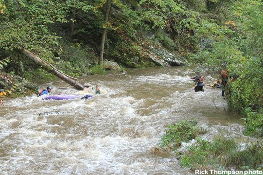 A group of people are rafting down a river.
