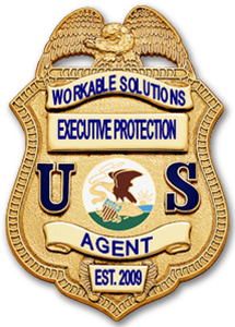 Gold US Agent executive protection badge with eagle emblem and blue lettering, reading 