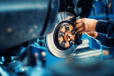 Mechanic Replacing Car Brake Pads — Algonac, MI — Clate's Performance Inc.