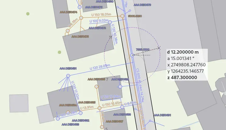 Overhead view of a map with building outlines, lines, measurements, and labels in a field.