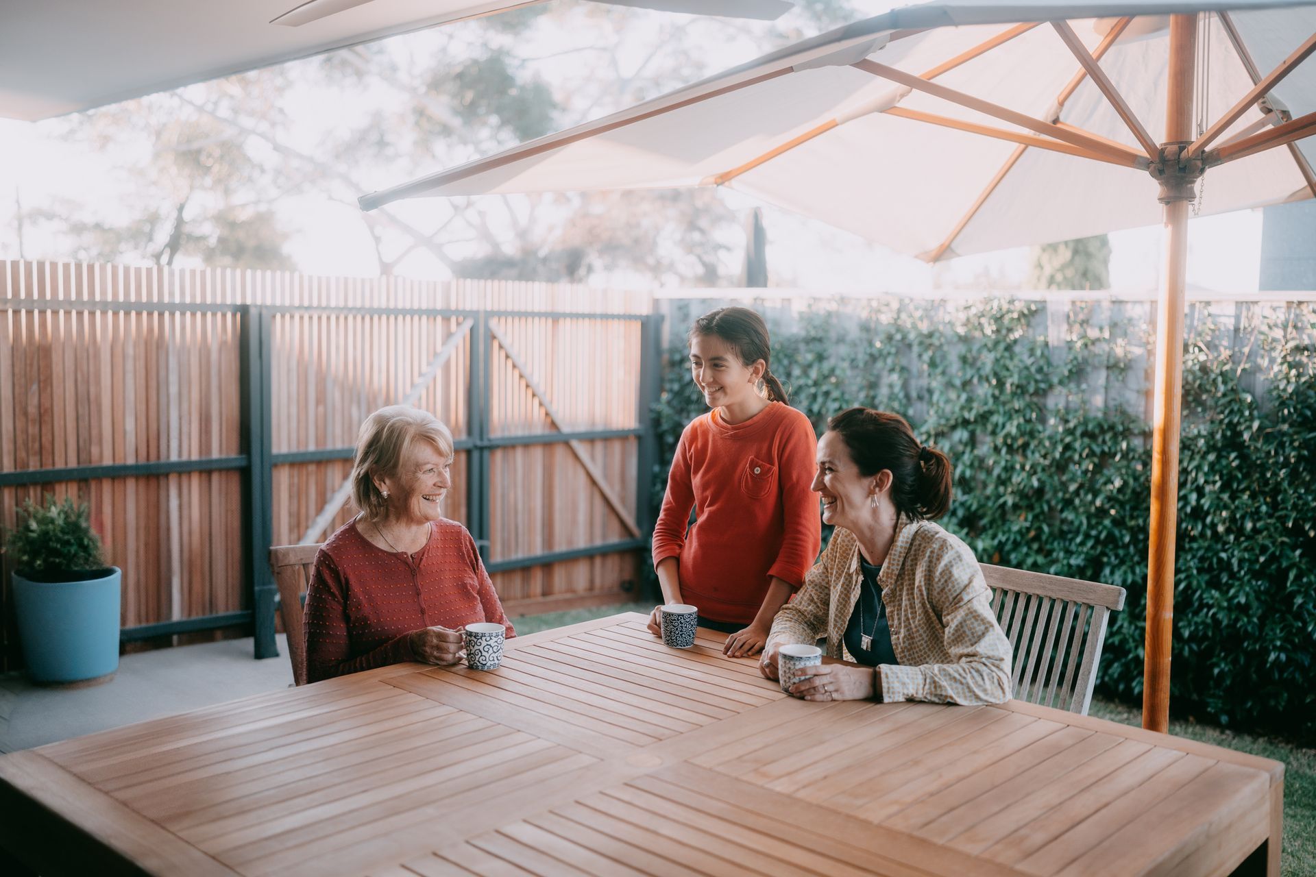 A group of women sitting at a table.