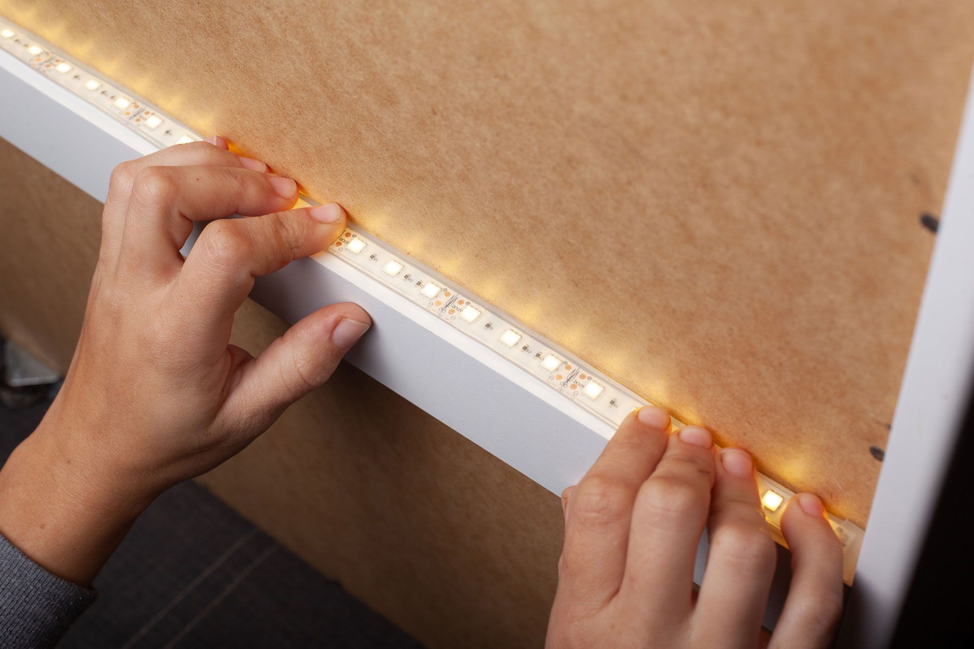 Electrician attaching LED lights