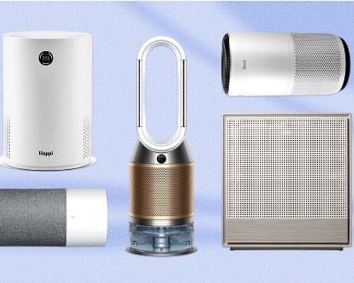 A group of air purifiers are lined up on a blue background