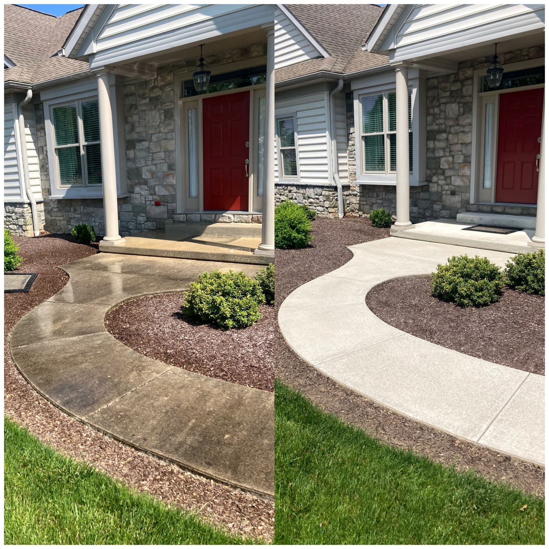 Front walkways to a stone house with red doors and white shutters, landscaped with mulch and shrubs