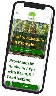 A cell phone is displaying a website for a landscaping company.