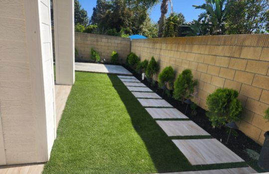 Garden with nice red and white flowers — Anaheim, CA — SG Gardening Landscape & Tree Services