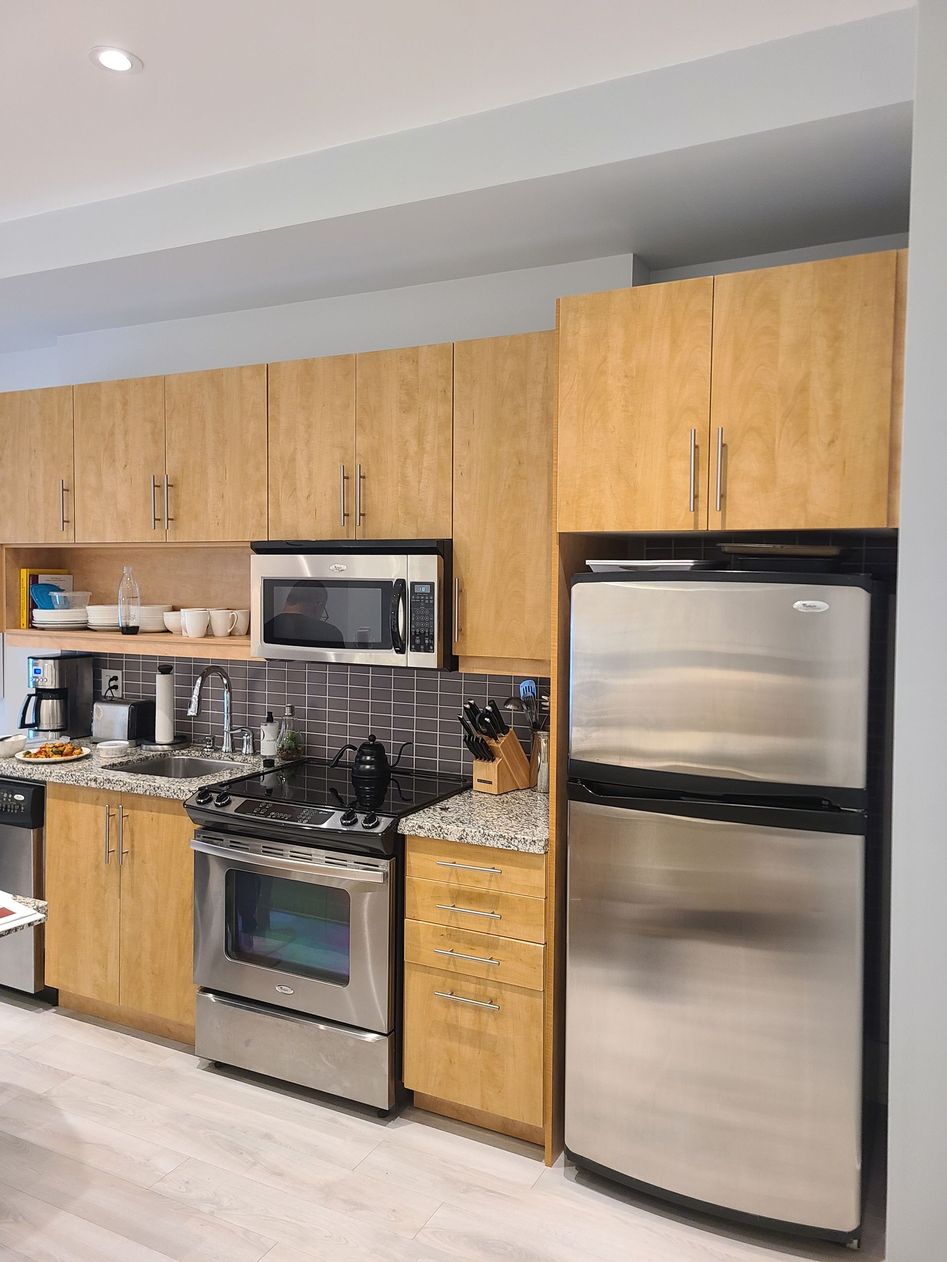 Kitchen cabinet vinyl wrap in light wood finish