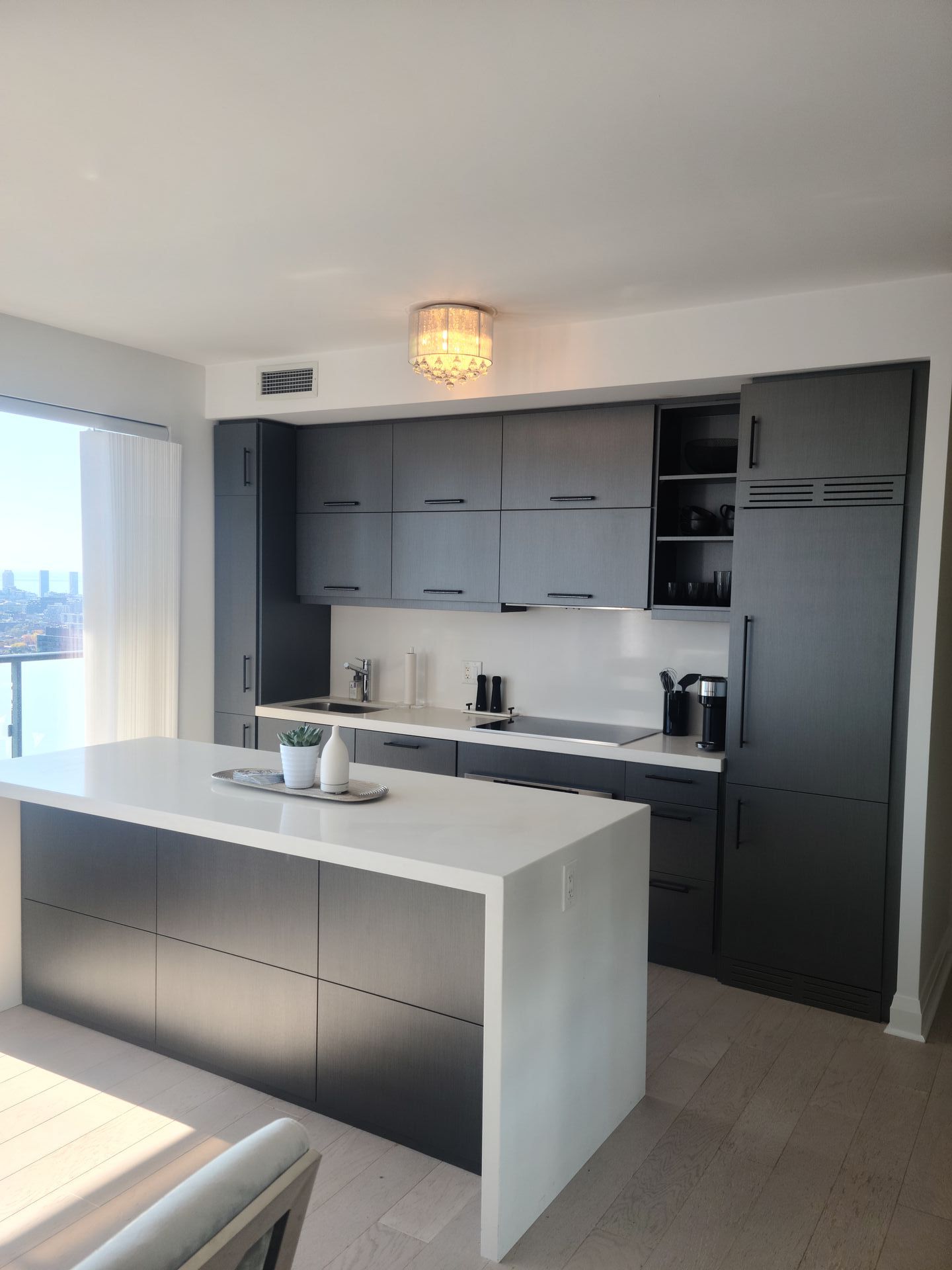 Dark grey kitchen cabinet wrap installation