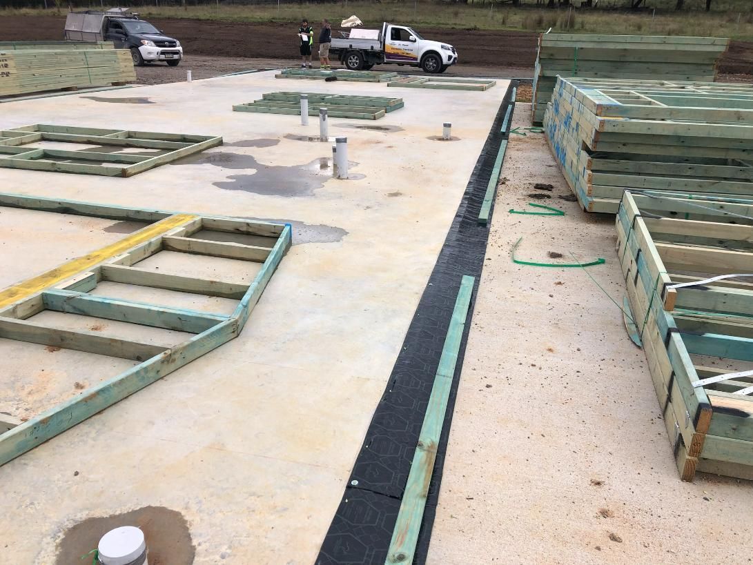 A Construction Site With a Truck Parked in the Background — TC Pest & Termite Control In Bowral, NSW