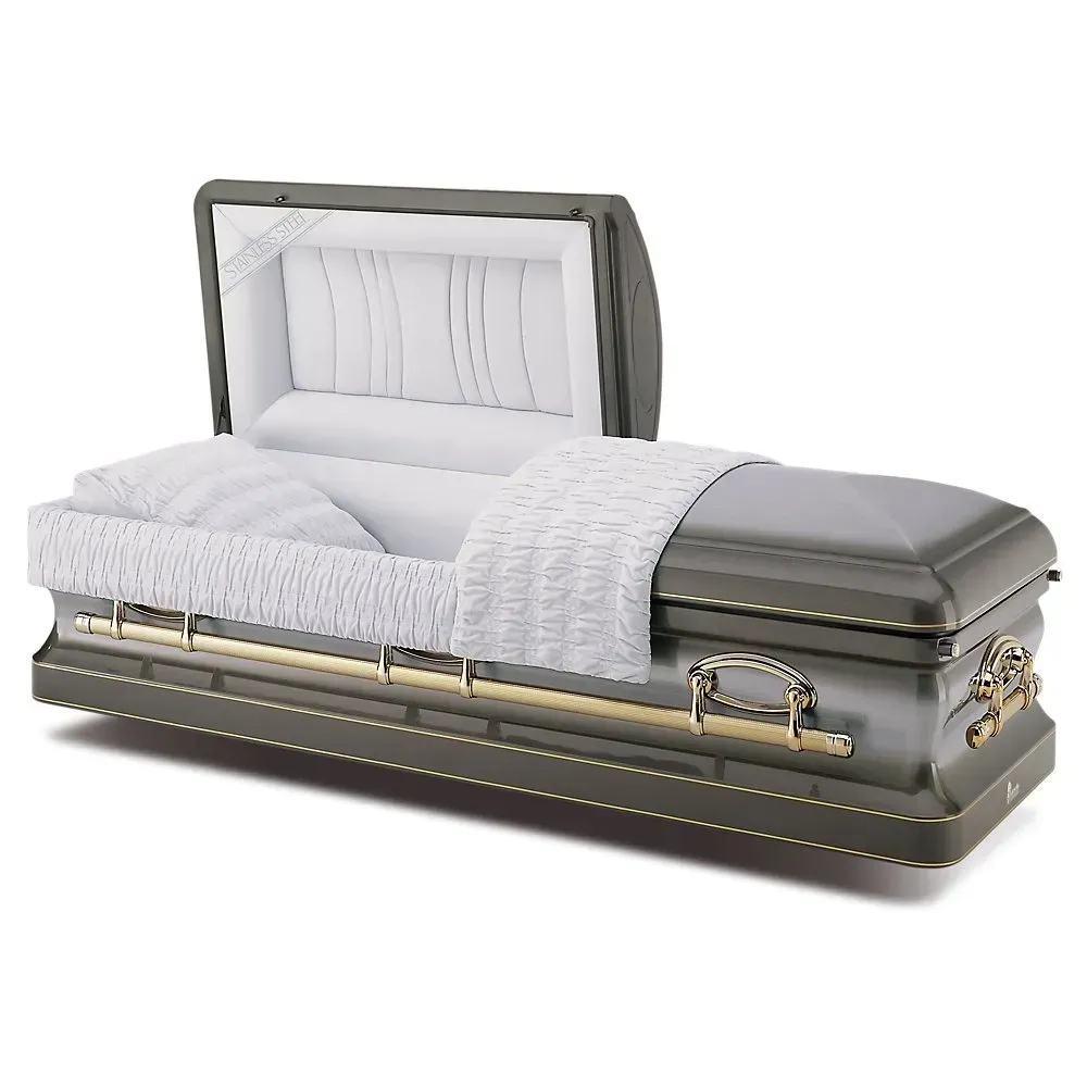 Gray coffin styled as a bed with white bedding and a decorative headboard, displayed on a white background