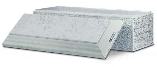 White speckled architectural moldings with one piece angled in front, on a white background