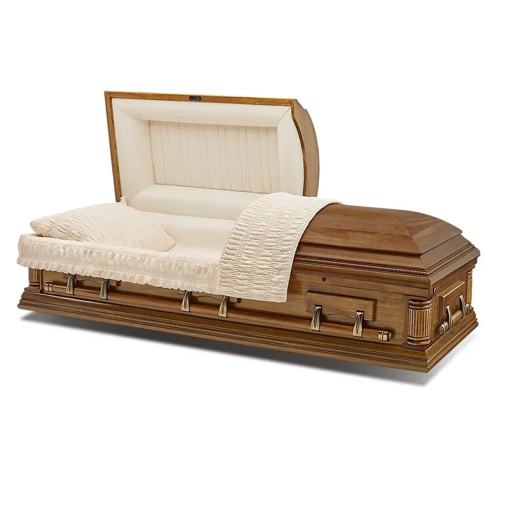 Cream-colored quilted coffin in polished wood casket with open lid, isolated on white background