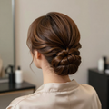 Finished styled updo on a client viewed from behind