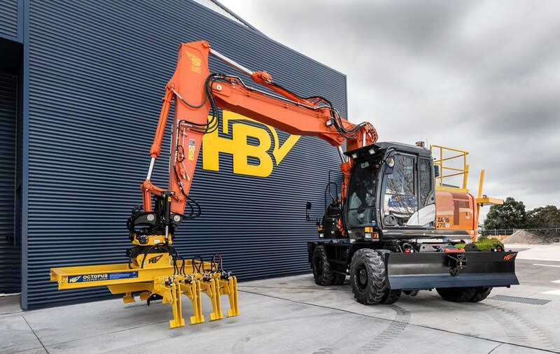 Harrybilt Engineering & Hitachi Construction Machinery Australia holding stock rail machines S Series Wheeled Excavators with octopus sleeper grab rail attachment