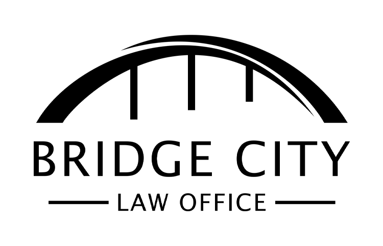 Black and white logo for Bridge City Law Office with a bridge graphic above the text.