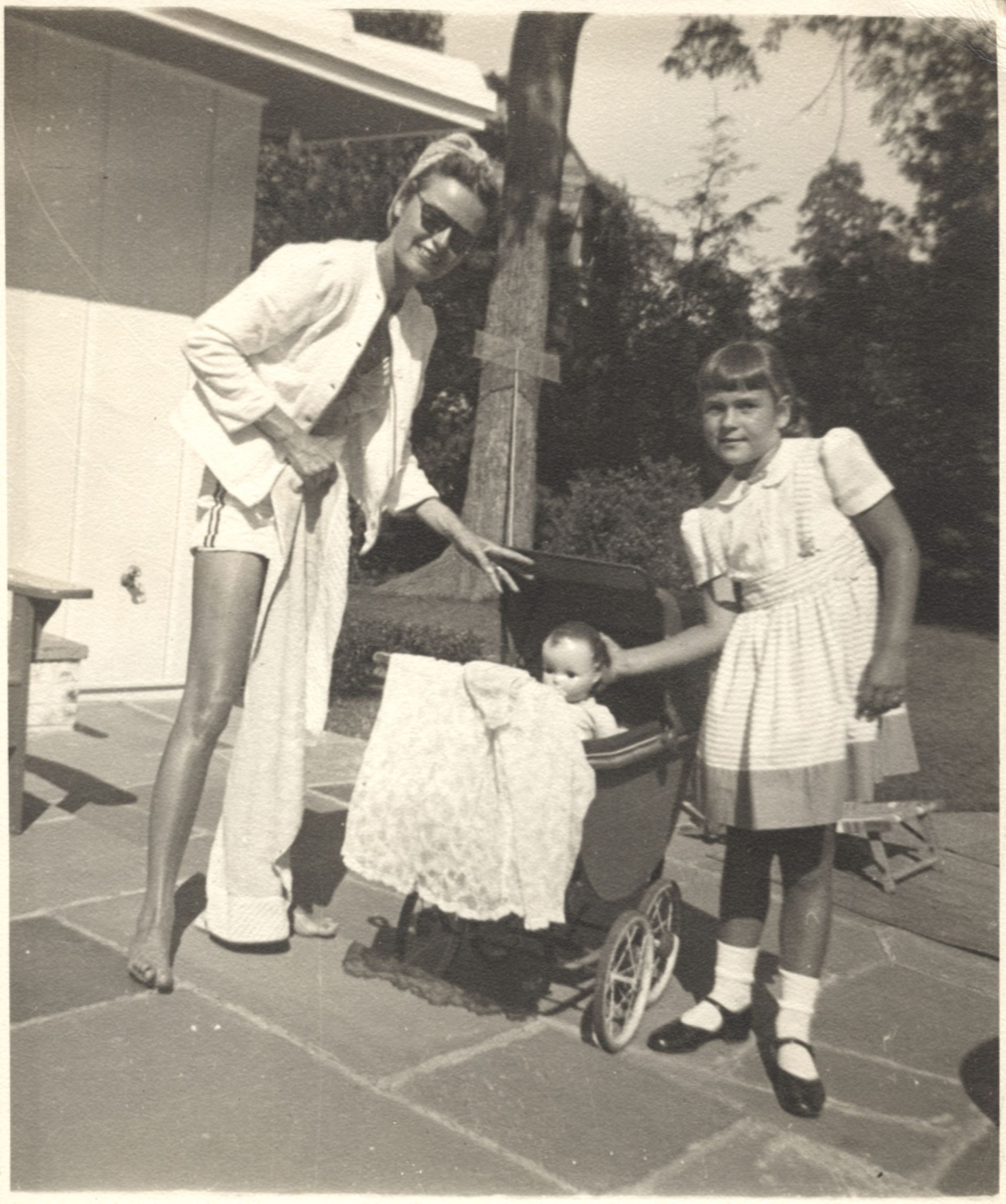 Sheila and Maggi Johnson by the pool house, 1942. Morven Archive, Sheila Johnson Brutsch Collection.