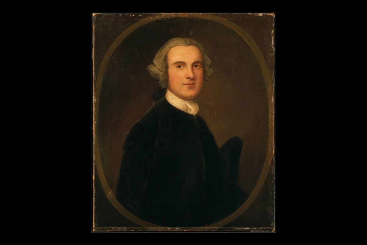 Formal painted portrait of a man in dark clothing within an oval frame on a dark background
