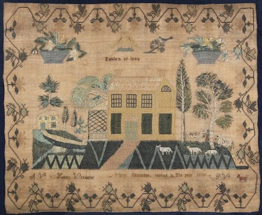 Embroidered sampler: yellow house, blue sky, floral border, sheep, trees, text.
