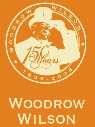 Woodrow Wilson in orange circle, top hat, saluting.