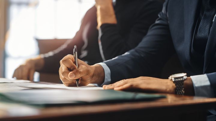 Lawyer Signing a Document