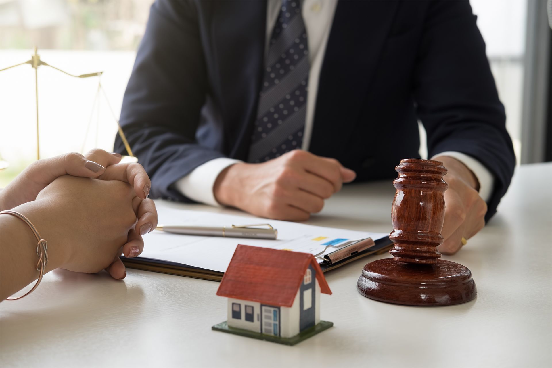 Lawyer With His Client Discussing About Real Estate Law