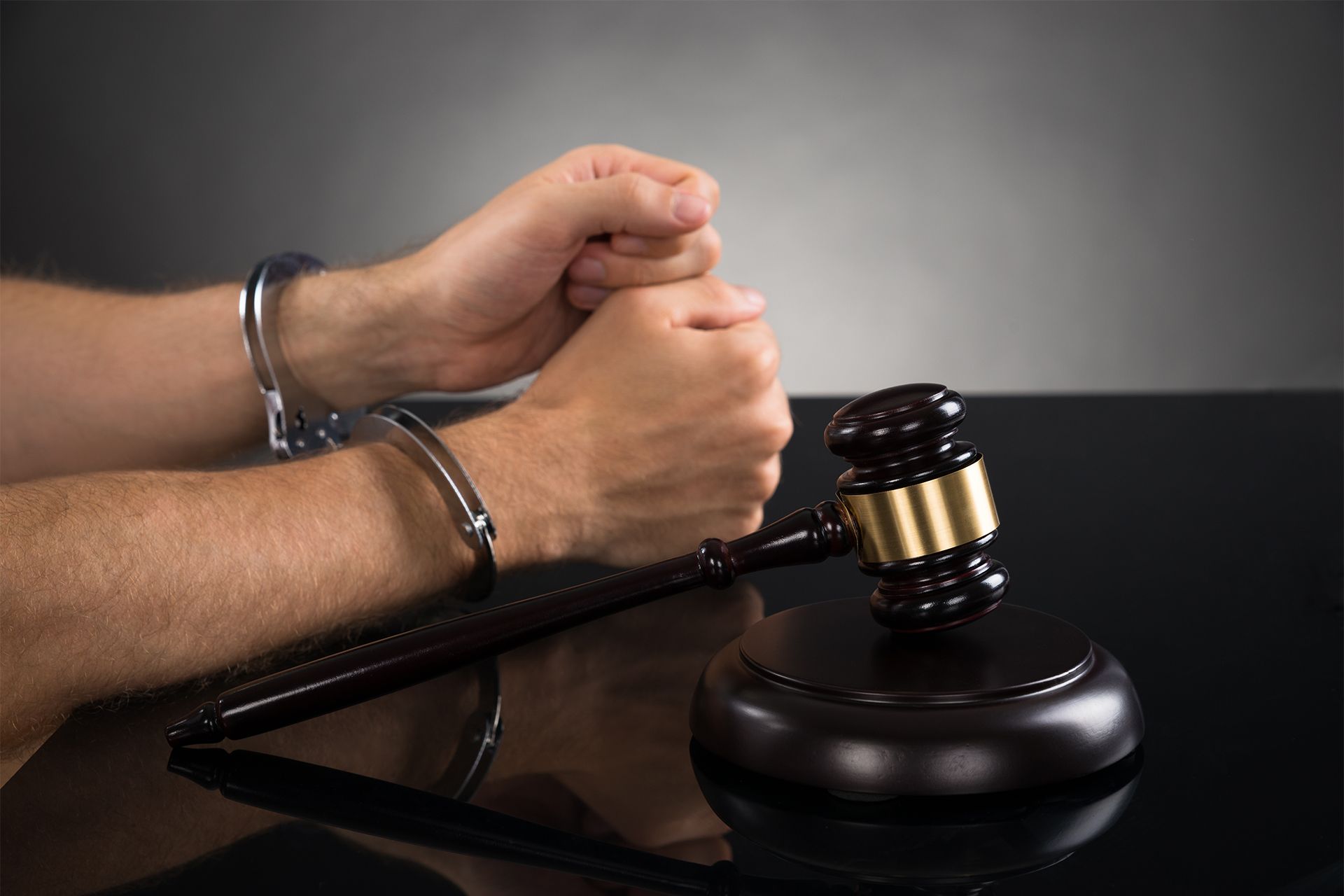 Criminal With Handcuffs and Gavel