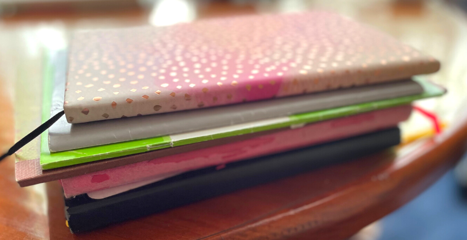 Always take a few minutes to safely store copies of your writing when it's published. A stack of journals and notebooks