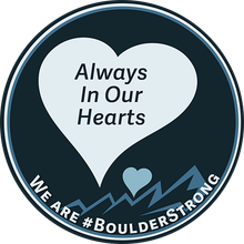 Memorial heart logo with “Always In Our Hearts” and “We Are #BoulderStrong” on dark background
