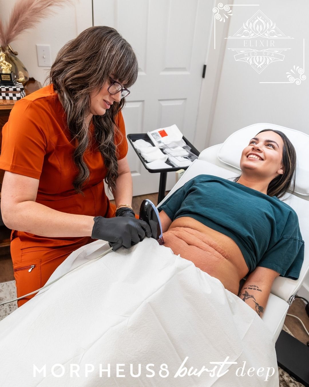 A woman is laying on a bed getting a treatment from a nurse.