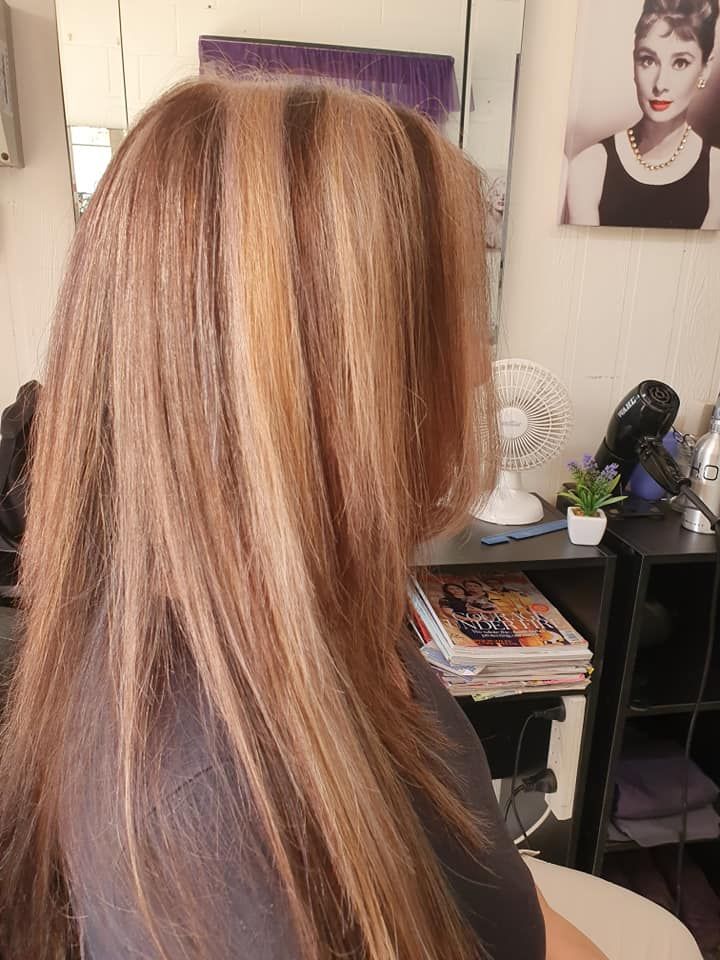 Woman's Long, Highlighted Hair in a Salon — Amore 'D' Hair Studio in Mudjimba, QLD