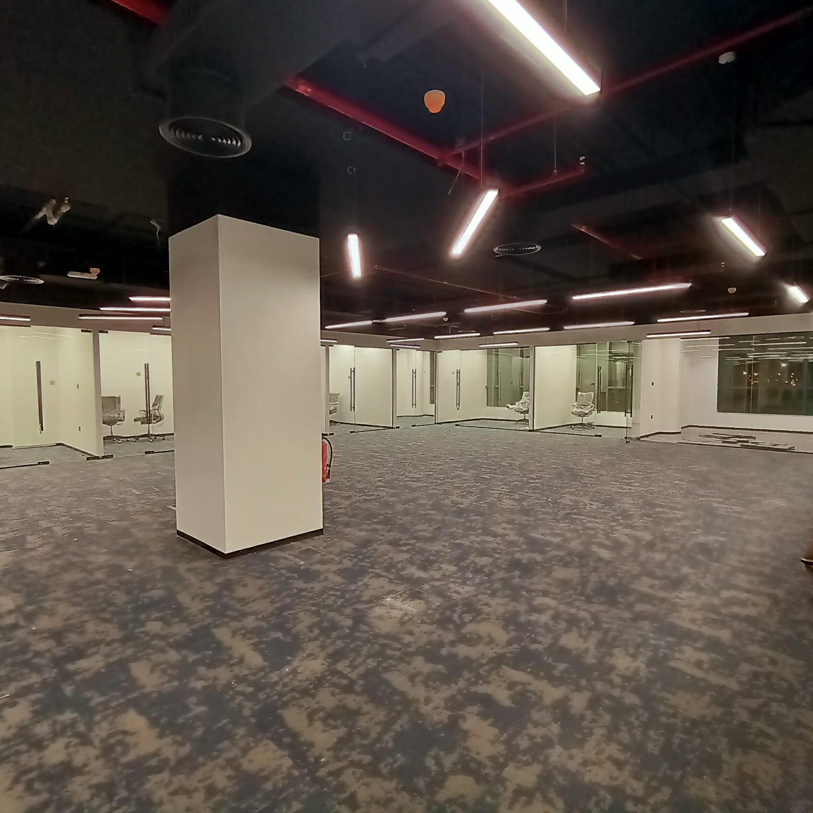 Open-plan corporate office flooring and ceiling works Dubai commercial fit-out project
