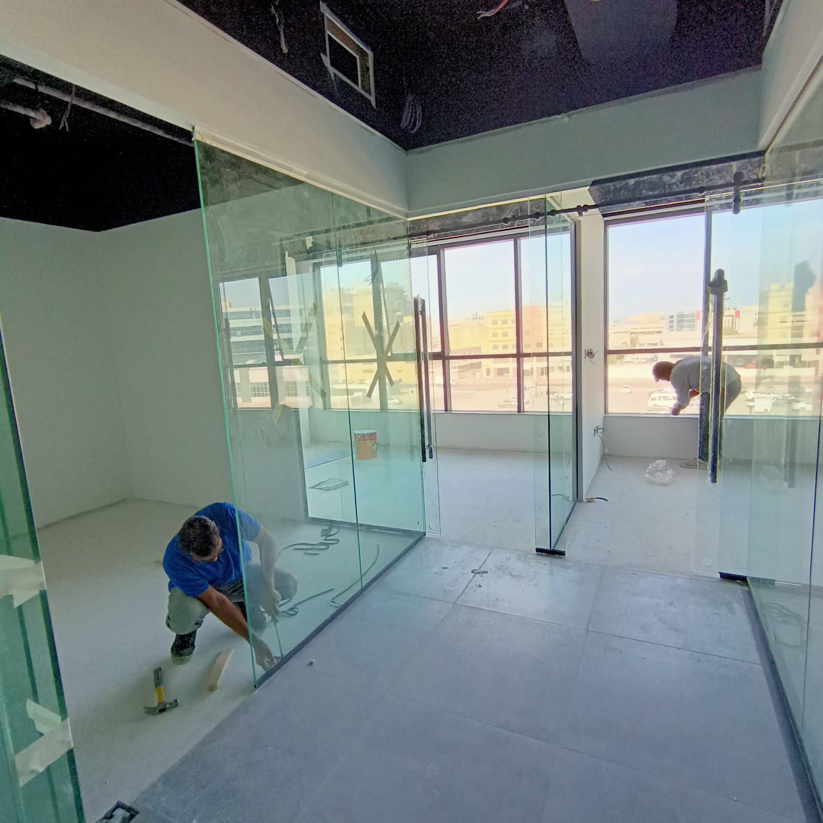 Modern layout design with Glass partitions in Dubai Palm Jumeirah. Designed and executed by Concept Art Decor