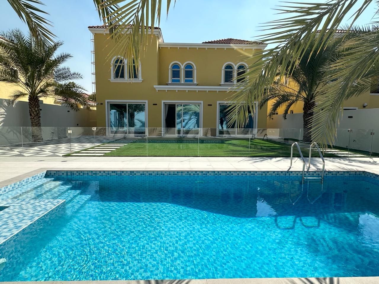 Luxury villa renovation in Jumeirah Park Dubai with modern pool and upgraded façade