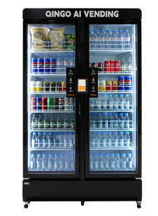 A black smart vending machine filled with drinks and snacks. Features 24-hour smart vending with a swipe-tap-grab process.